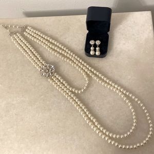 3 strand pearl necklace and earrings set.
